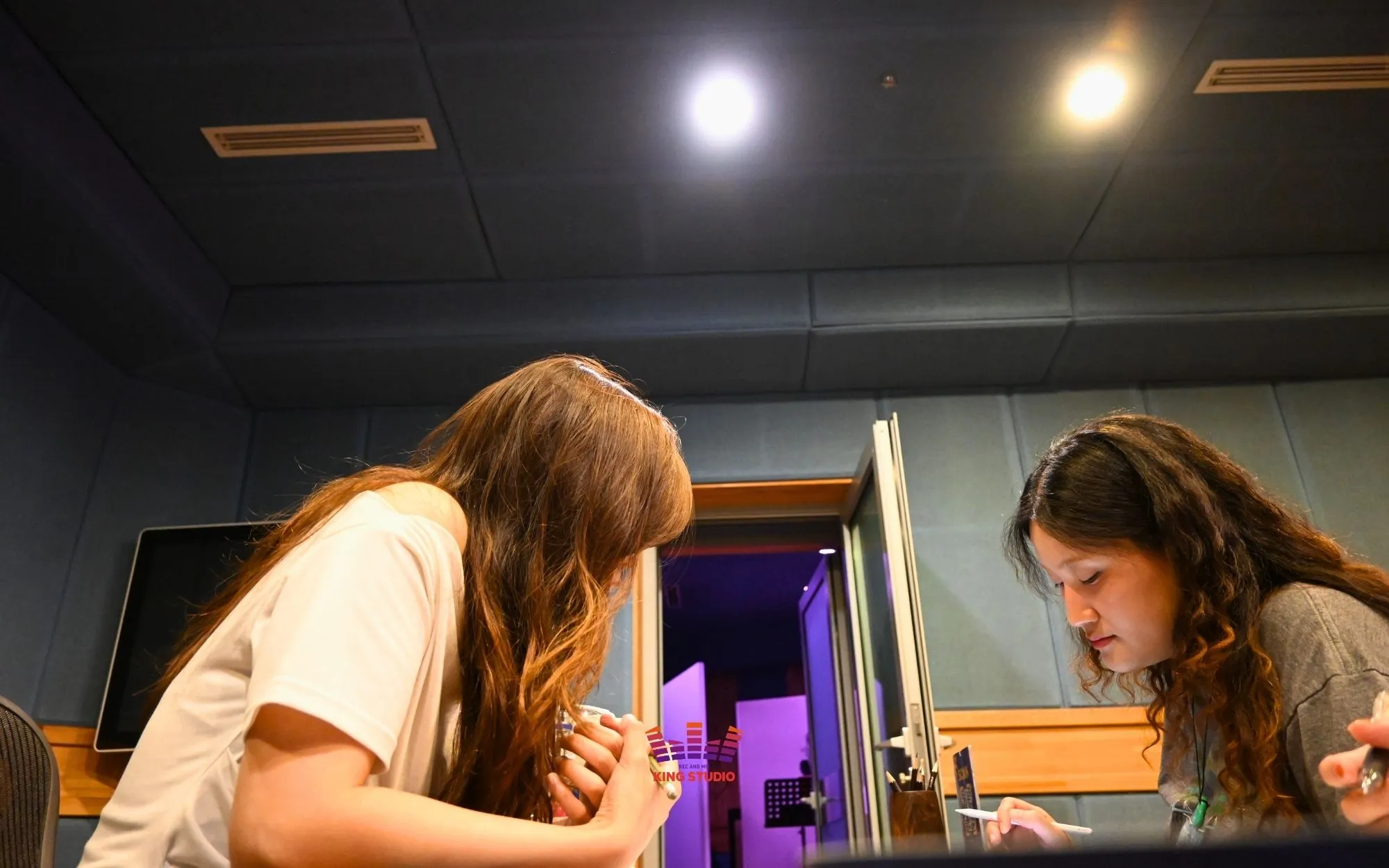 Song parts division and key adjustment process for Seoul experience K-Pop recording