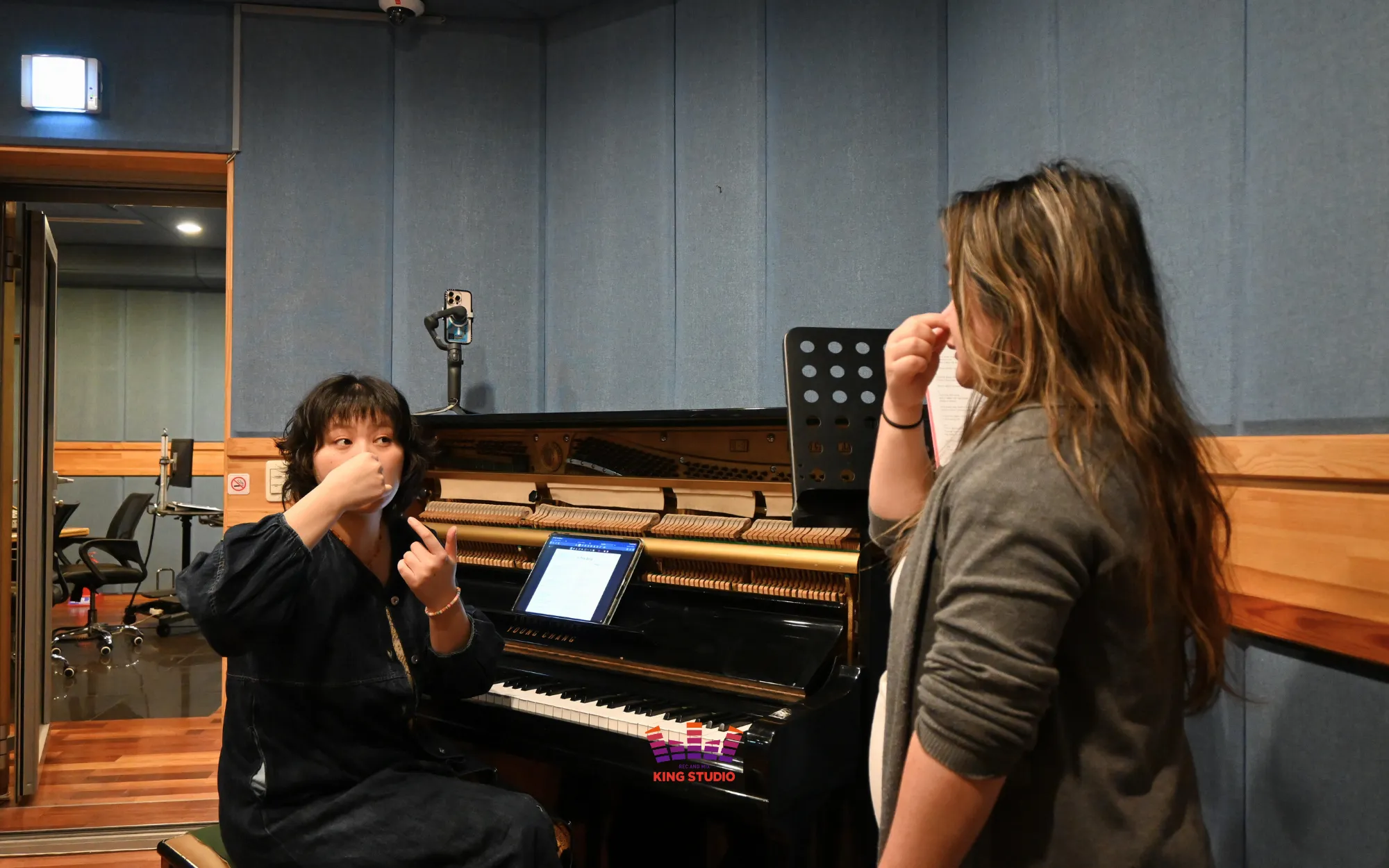K-pop vocal directing practice with professional coach at KING STUDIO Seoul - Essential Korea travel bucket list experience