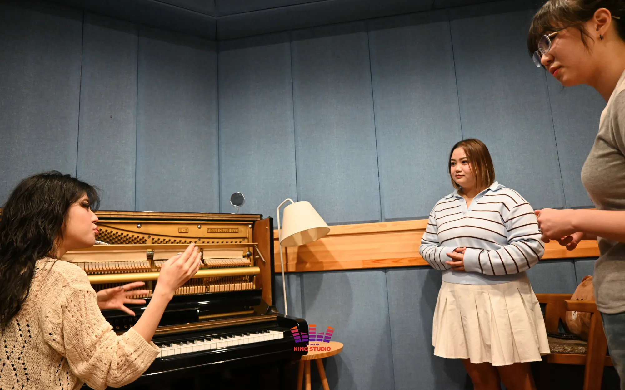 Kimberly in vocal training with KING STUDIO vocal director Jisun before recording