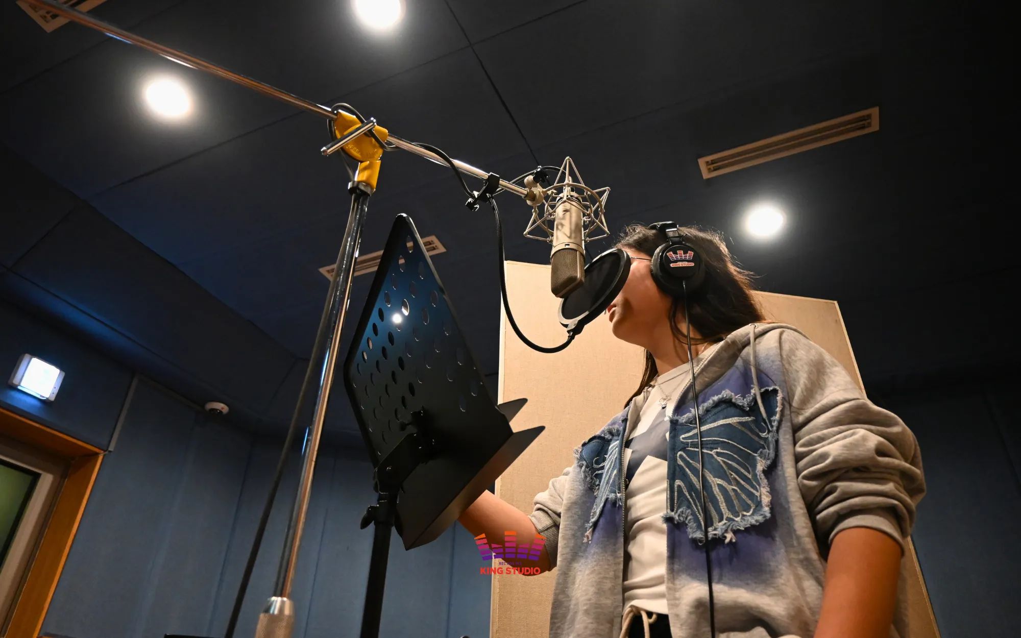 Wu Yuan recording in the booth at KING STUDIO