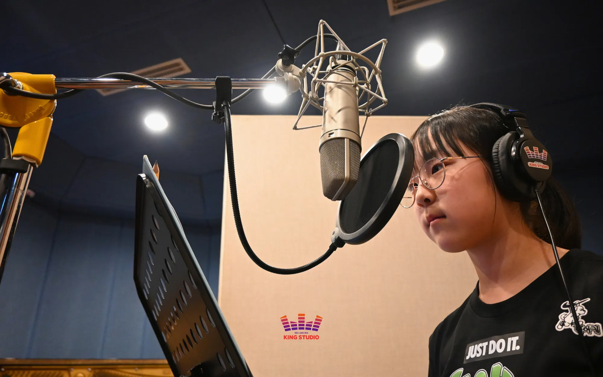 Eldest sister recording her anchoring vocal part at KING STUDIO