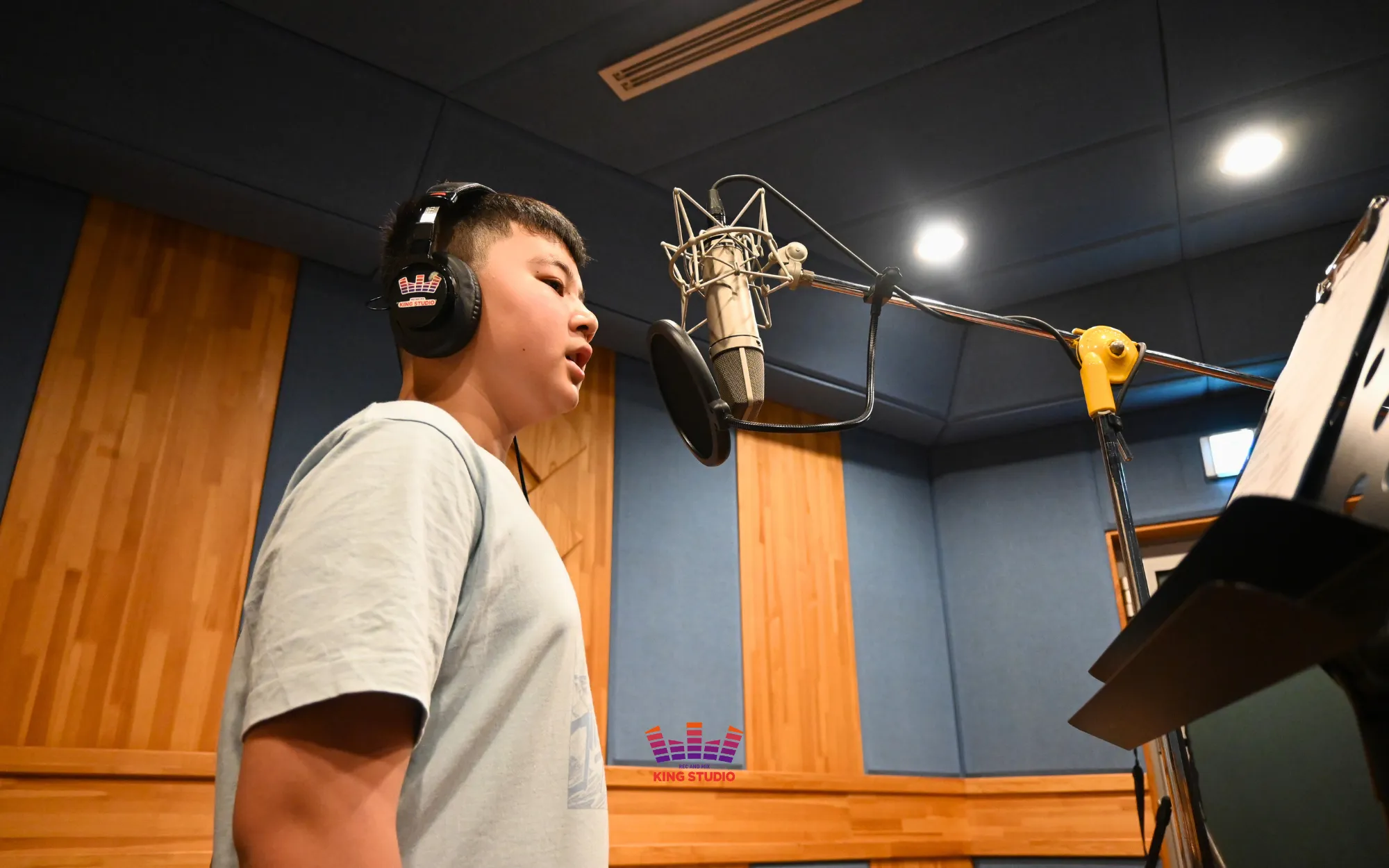 Marcus recording 5 Seconds of Summer's "Teeth" in the professional booth at KING STUDIO